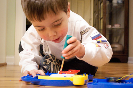 Preschooler Keeping Himself Occupied