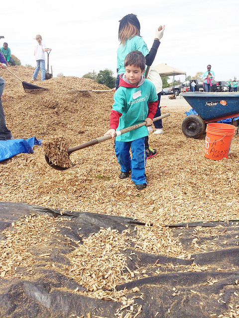 KaBOOM! Community Playground Build moving mulch
