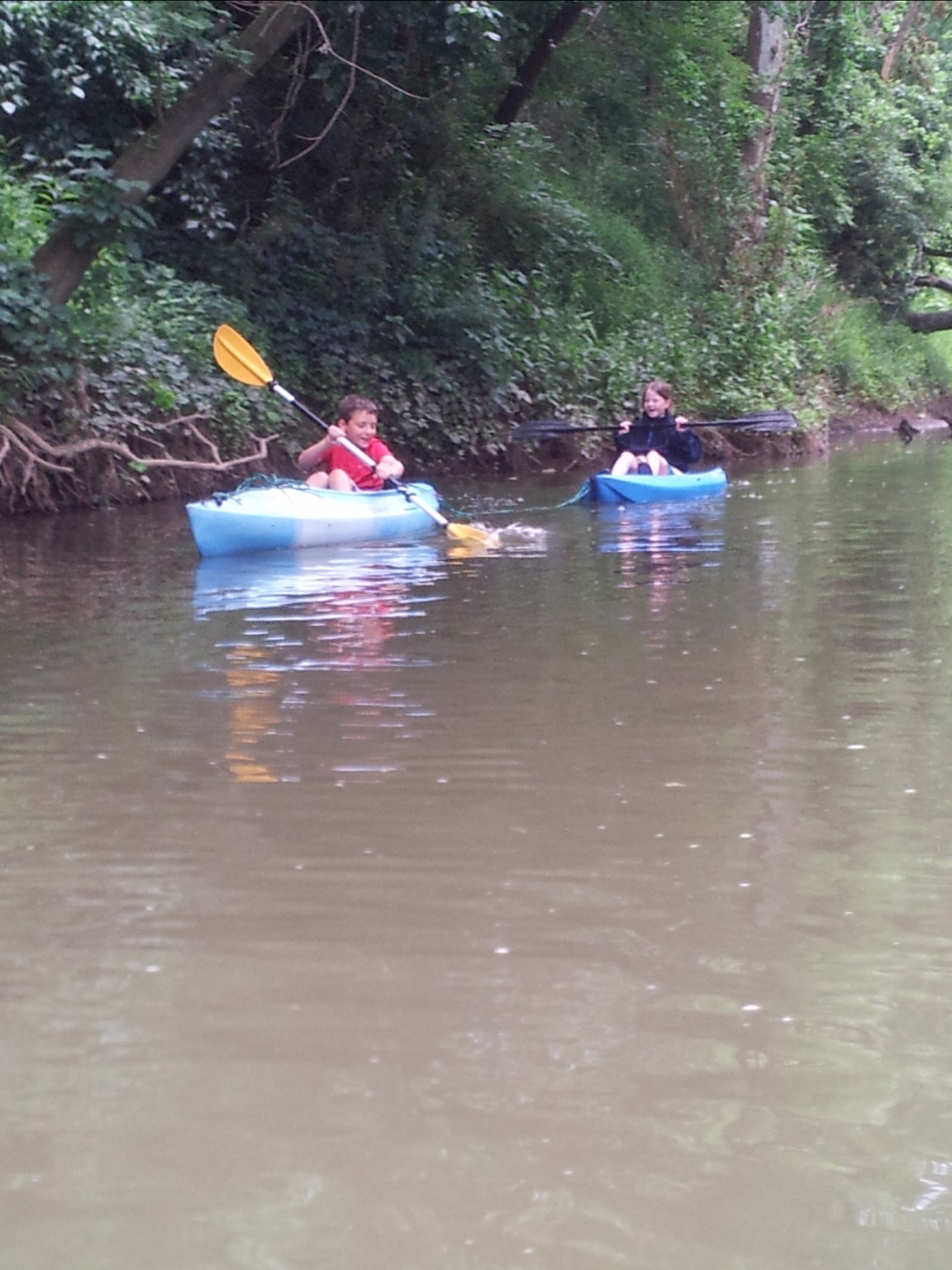 Towing kids on kayaks