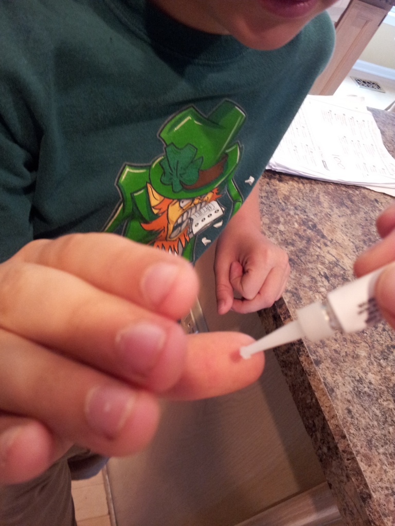 superglue your fingers together